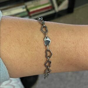 Silver heart bracelet with arrow toggle close Women